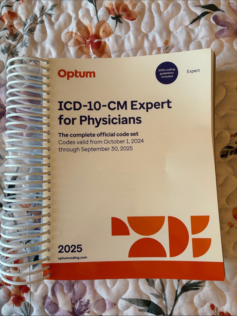 ICD-10-CM Expert for Physicians 2025 — White and Orange Reference Guide